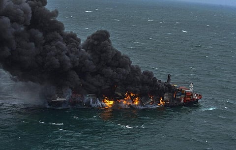 Smoke rises from the container vessel MV X-Press Pearl engulfed in flames off Colombo port, Sri Lanka. (Photo | AP)