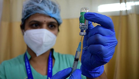 A health worker during the COVID-19 vaccination drive. (Photo | Shriram BN, EPS)