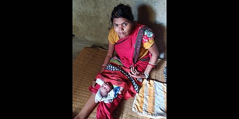 Sonali with her newborn.