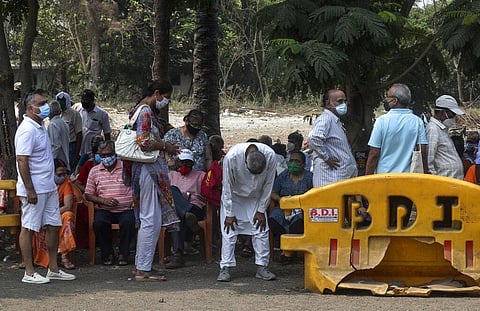 People queue up for COVID-19 vaccine in Mumbai, India. (File Photo | AP)