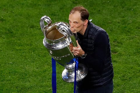 Chelsea's German coach Thomas Tuchel celebrates with the trophy after winning the UEFA Champions League final football match at the Dragao stadium in Porto on May 29, 2021. (Photo | AFP)