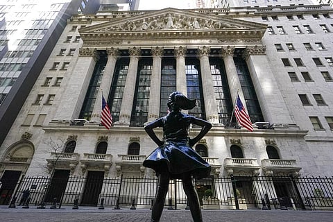In this March 23, 2021 file photo, the Fearless Girl statue stands in front of the New York Stock Exchange in New York's Financial District. (Photo | AP)