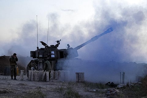 An Israeli artillery unit fires toward targets in Gaza Strip, at the Israeli Gaza border. (File Photo | AP)