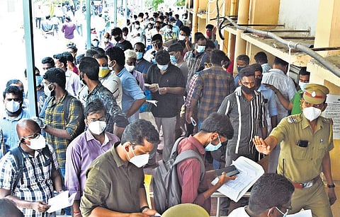 People waiting in a long queue to get Remdesivir at Kilpauk Medical College Hospital in Chennai. (Photo| Ashwin Prasath, EPS)