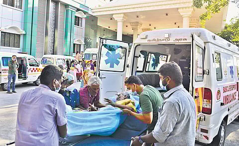 Ambulances piled up outside RGGGH in Chennai as patients wait to get admission into the Corona Outpatient Department on Wednesday | de badatta adattaadatta adatta ma llic k
