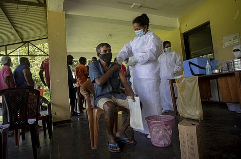 A Sri Lankan man gets vaccinated against the coronavirus in Colombo, Sri Lanka, Wednesday, May 5, 2021. (Photo | AP)
