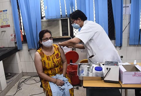 A beneficiary gets the COVID19 vaccine, at a government Hospital (COVID-19 Centre) in New Delhi on Friday. (Photo | Parveen Negi/EPS)