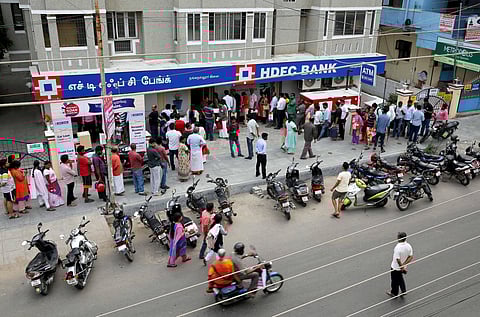Customers waiting before an HDFC Bank branch in Chennai (Photo | EPS)