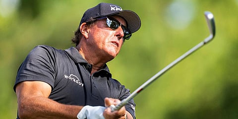 Phil Mickelson watches his tee shot on the sixth hole during the first round of the Wells Fargo Championship golf tournament at Quail Hollow. (Photo| AP)