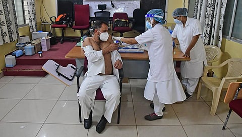 A person takes a vaccine at KC General Hospital in Bengaluru. (Photo | Ashishkrishna HP, EPS)