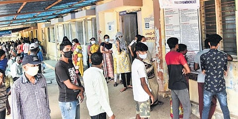 A large number of people gather in line to get medication for their ailments in Hyderabad on Friday. (Photo| Vinay Madapu, EPS)
