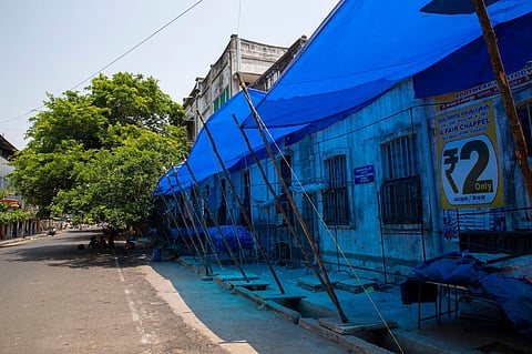 A street in Puducherry wears a deserted look as the UT observes the lockdown to control COVID surge. (Photo | G Pattabi Raman, EPS)