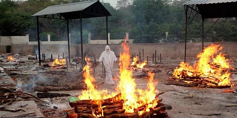 A Bhopal crematorium burns bodies in rows as the facilities get overwhelmed by the number of deaths. (Photo | PTI)