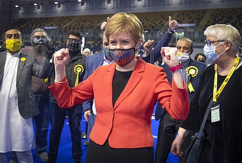 First Minister and SNP party leader Nicola Sturgeon celebrates after retaining her seat for Glasgow Southside at the count for the Scottish Parliamentary Elections. (Photo | AP)