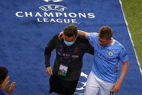 Manchester City's Kevin De Bruyne leaves the game after a foul by Chelsea's Antonio Rudiger during the Champions League final. (Photo | AP)