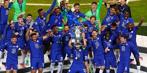 Chelsea players celebrate with the trophy after winning the Champions League final. (Photo | AP)