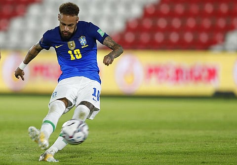 Brazil's Neymar shoots a free kick during a qualifying soccer match for the FIFA World Cup Qatar 2022 against Paraguay. (Photo | AP)