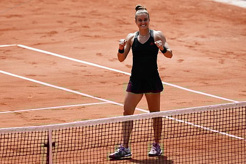 Maria Sakkari of Greece reacts after defeating Poland's Iga Swiątek during their quarterfinal match of the French Open. (Photo | AP)