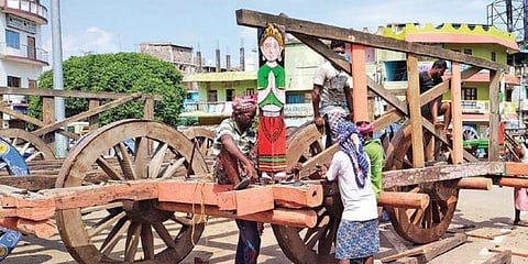 Carpenters constructing a chariot at Bada Danda in Baripada on Thursday. (Photo | EPS)