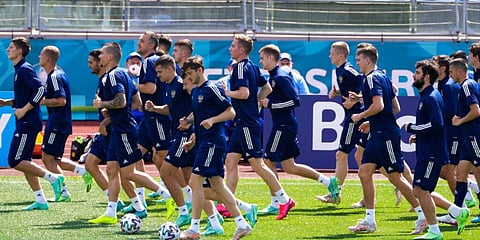 Russia players warm up during a training session. (Photo | AP)