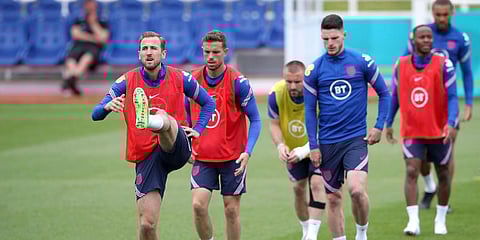 England's Harry Kane, left, and teammates during the training session at St George's Park, Burton upon Trent, England. (Photo | AP)