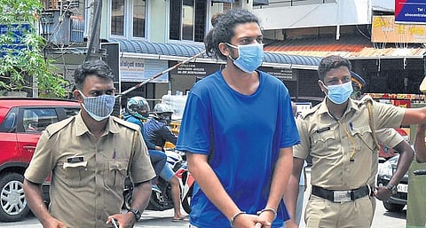 Police taking Martin, accused of raping a fashion designer after detaining her in a flat for nearly a month, to the Ernakulam General Hospital for a medical examination on Friday| A Sanesh