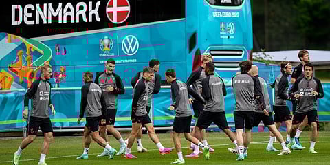 Denmark's captain Simon Kjaer, left, exercises with his team during a training session of Denmark's national team in Helsingor. (Photo | AP)