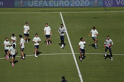 Spanish players run during a training session at the La Cartuja stadium in Seville, Spain, Sunday, June 13, 2021. (Photo | AP)
