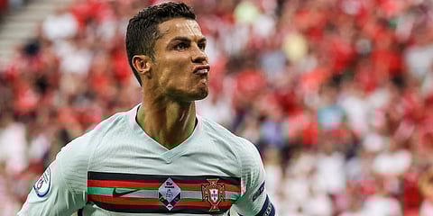 Cristiano Ronaldo celebrates after scoring his second team goal during the Euro 2020 group F match between Hungary and Portugal at the Ferenc Puskas Stadium in Budapest. (Photo | AP)