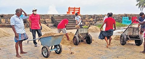 Volunteers removing the debris left behind by cyclone Tauktae | EXPRESS
