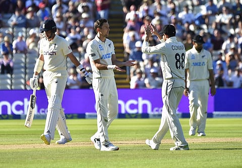 New Zealand's Trent Boult, second left, celebrates the dismissal of England's Stuart Broad, left, during the third day of the second cricket test match between England and New Zealand. (Photo | AP)