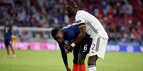 Antonio Ruediger (R) stands beside Paul Pogba during the Euro 2020 soccer championship group F match between France and Germany at the Allianz Arena stadium in Munich. (Photo | AP)