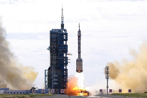 A Long March-2F Y12 rocket carrying a crew of Chinese astronauts in a Shenzhou-12 spaceship lifts off at the Jiuquan Satellite Launch Center in Jiuquan in northwestern China, June 17. (Photo | AP)