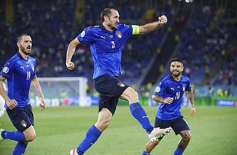Italy's Giorgio Chiellini, center, celebrates after scoring a VAR delete goal during the Euro 2020 soccer championship group A match between Italy and Switzerland. (Photo | AP)