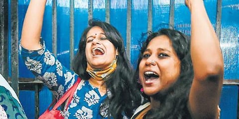 Natasha Narwal (L) and Devangana Kalita outside Tihar prison (Photo | PTI)