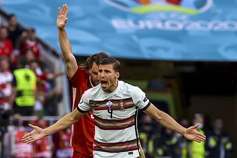 Portugal's Ruben Dias argues during the Euro 2020 soccer championship group F match between Hungary and Portugal at the Ferenc Puskas stadium in Budapest. (Photo | AP)