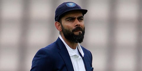 Virat Kohli waits for the toss ahead of the second day of the World Test Championship final cricket match between New Zealand and India. (Photo | AP)