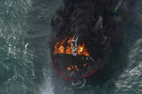 In this photo provided by Sri Lanka Air Force, smoke rises from the container vessel MV X-Press Pearl engulfed in flames off Colombo port, Sri Lanka. (Photo | AP)
