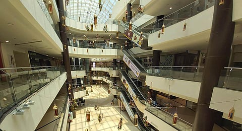 Only a few customers walk into a mall, after lockdown restrictions were relaxed in the State, on Tuesday in Hyderabad. (Photo | S Senbagapandiyan, EPS)