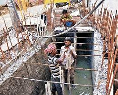 A stormwater drain under construction (EPS)