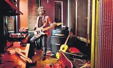 Akshay Bhatt at his studio with a few of his vintage guitars. (Photo| EPS)