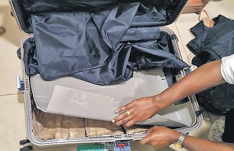 The trolley bag containing heroin seized from Zimbabwean national
