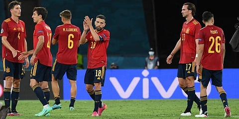 Spanish players react after the Euro 2020 soccer championship group E match between Spain and Poland at the La Cartuja stadium in Seville. (Photo | AP)