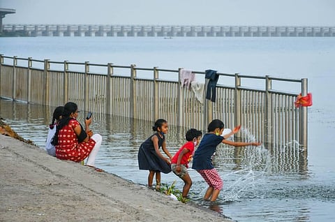 With extended curfew relaxation hours, people chill out near Krishna river in Vijayawada on Monday | Prasant Madugula