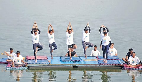 children on a raft at the Yamuna Ghat | Parveen Negi/Express