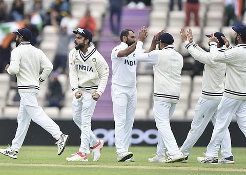 Indian cricket team celebrates after a wicket during their WTC final match with New Zealand. (Photo | PTI)