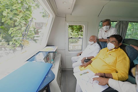 CM BS Yediyurappa and Revenue Minister R Ashok travelling on an Inspection Special train between Cantonment and Heelalige railway stations on Thursday morning (Photo | Special arrangement)