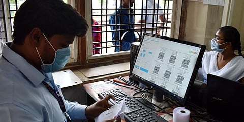 Officers from the Archaeological Survey of India in the city wear masks at the Golconda Forts ticket counter. (File Photo | Senbagapandiyan, EPS)
