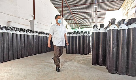 CM Kejriwal inspects oxygen cylinders imported from China at Mayapuri depot. (File Photo | Express)