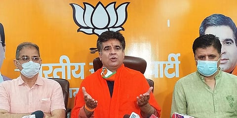 Jammu and Kashmir BJP president Ravinder Raina along with other leaders addresses during a press conference, in Jammu. (Photo | ANI)